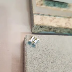 Inicial prata H
