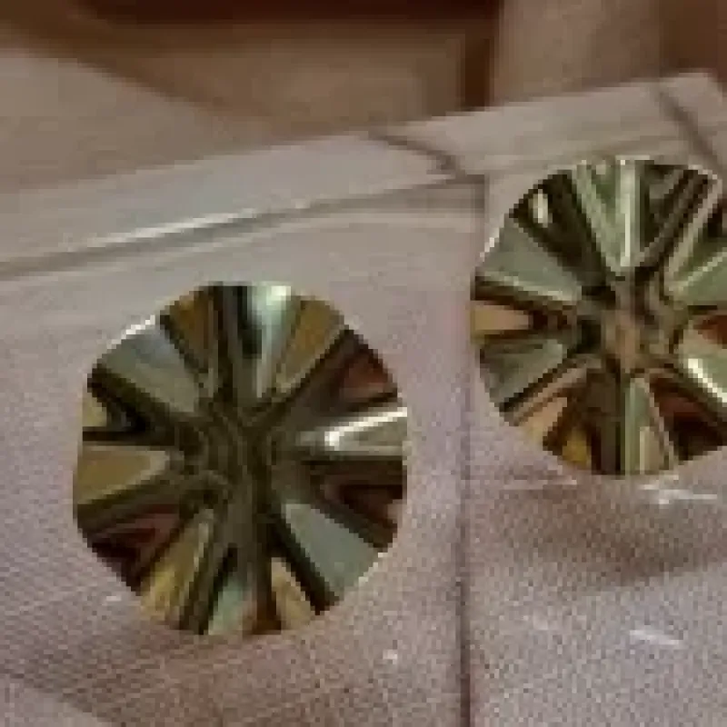 BRINCO OURO DISCO RAIOS	