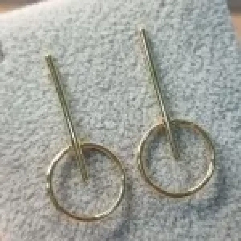 BRINCO OURO PINO CIRC	