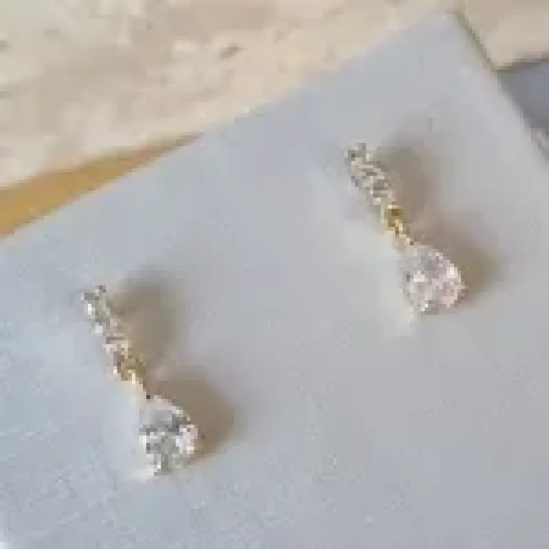 BRINCO OURO PINO GOTA ZIRC	