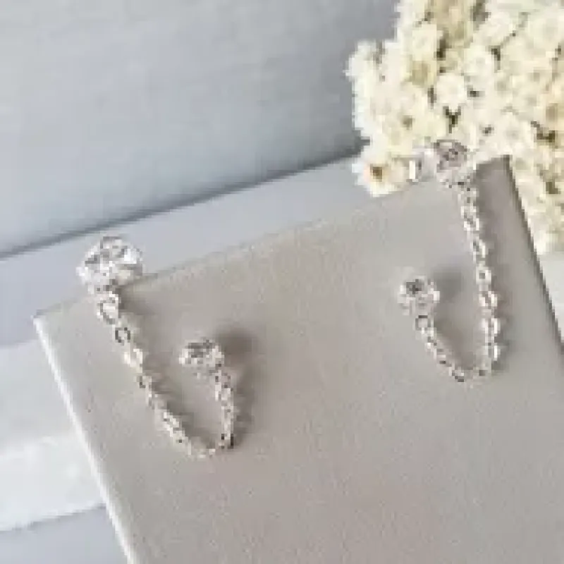 BRINCO PRATA DOIS PONTOS