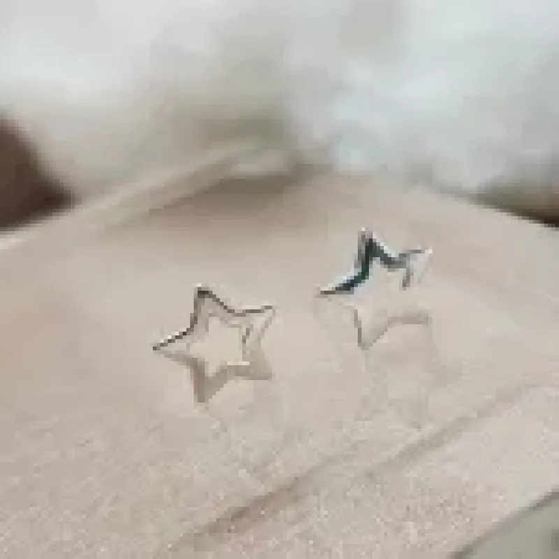 BRINCO PRATA ESTRELINHA VAZADA	