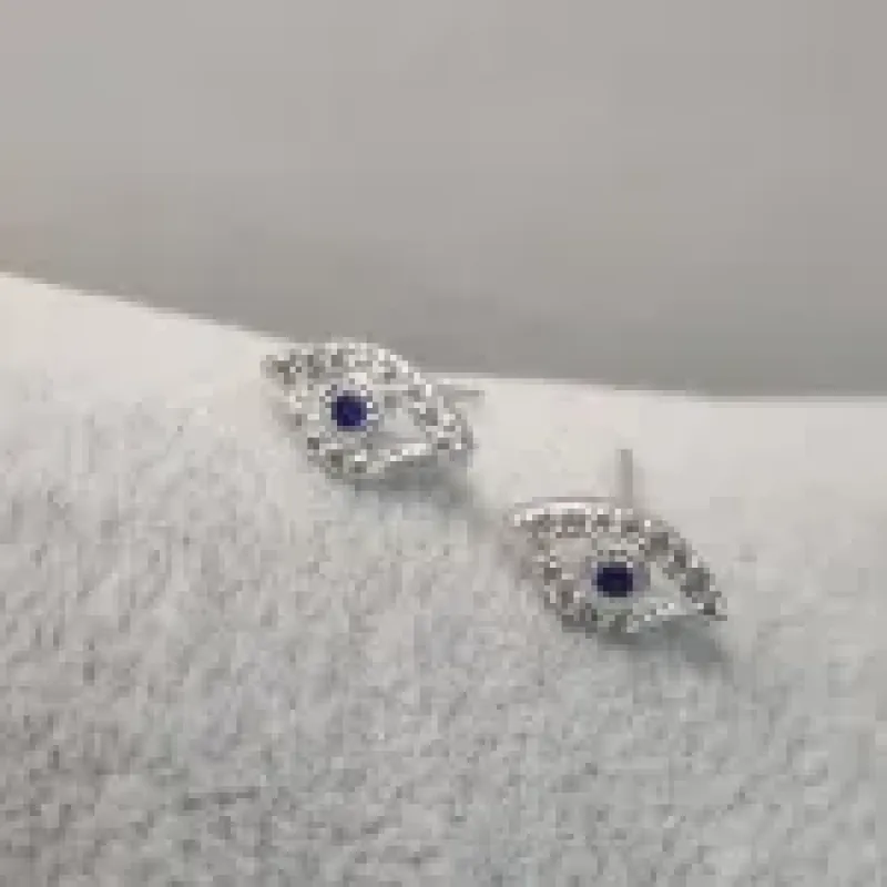 BRINCO PRATA OLHO ZIRC	