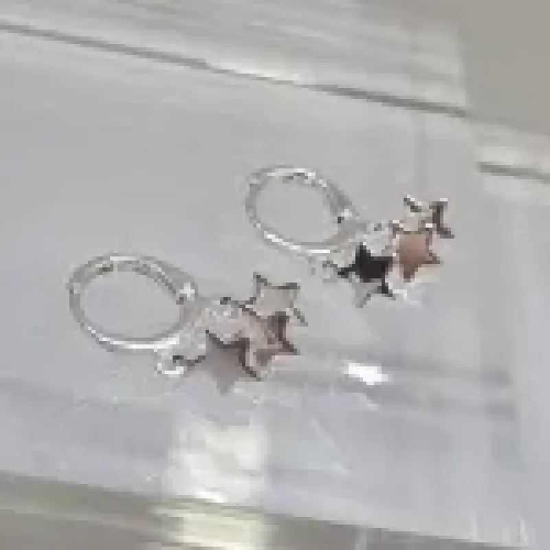 BRINCO PRATA TRANQUETA ESTRELAS	