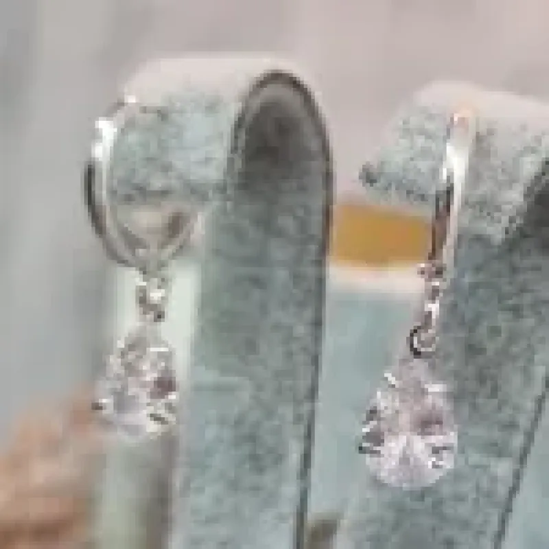 BRINCO PRATA TRANQUETA GOTA BRANCA	
