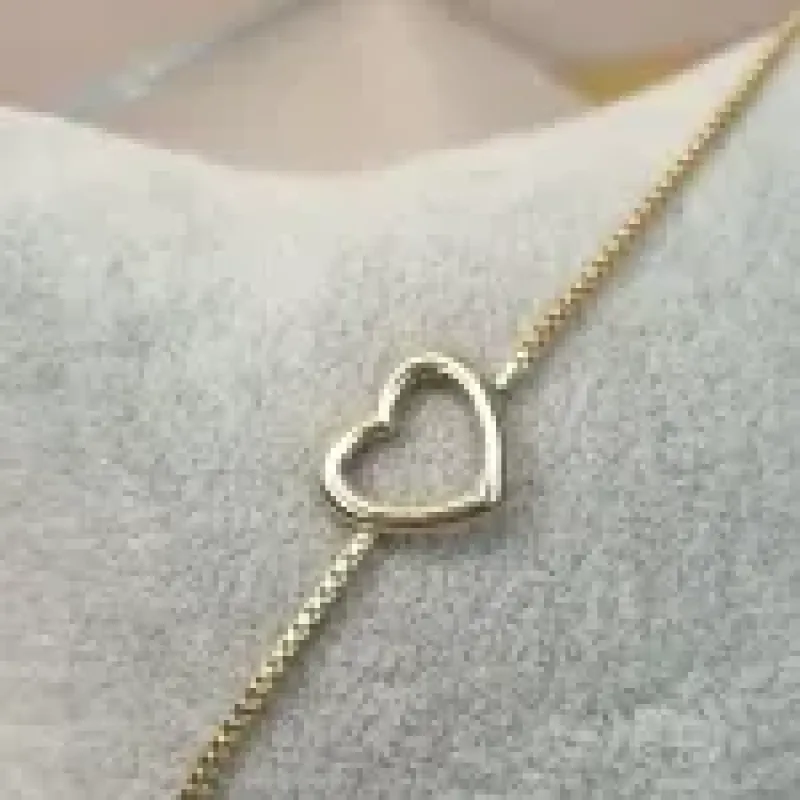 PULSEIRA OURO CORAÇÃO VAZADO	