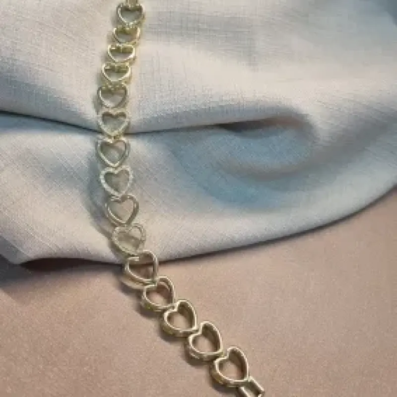 PULSEIRA OURO CORAÇÕES VZ	