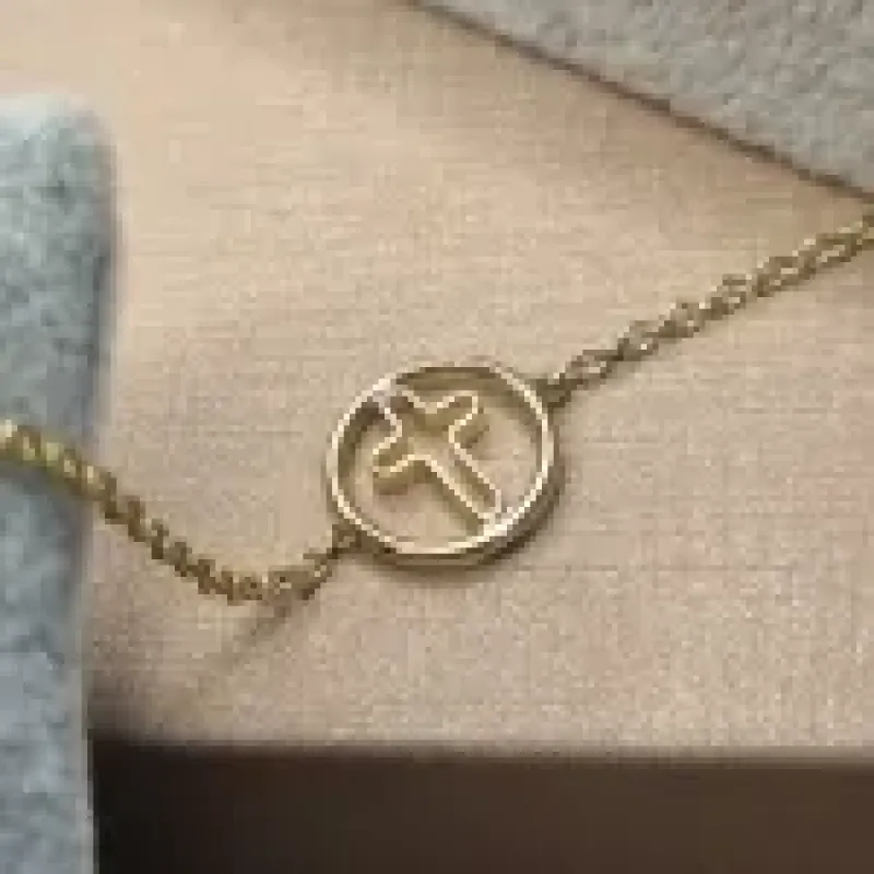 PULSEIRA OURO CRUCIFIXO VAZADO	
