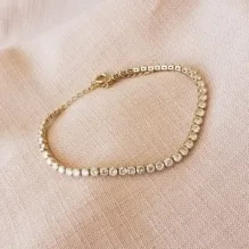 PULSEIRA OURO RIVIERA CRISTAL