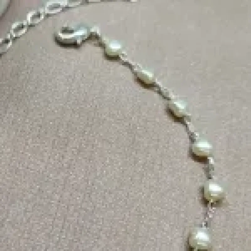 PULSEIRA PRATA CORAÇÃO PEROLA