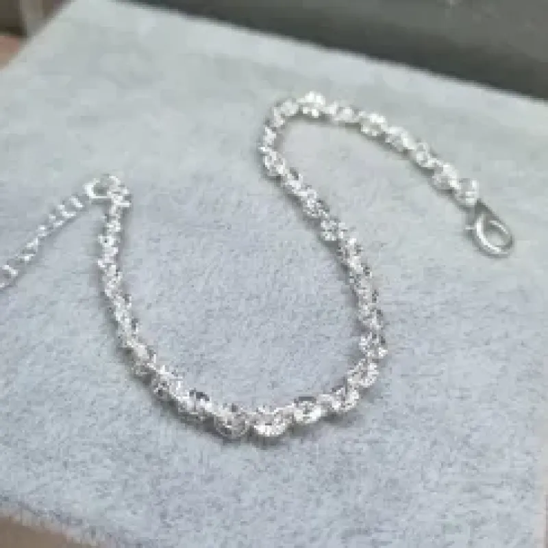 PULSEIRA PRATA ELOS DESENHADOS	