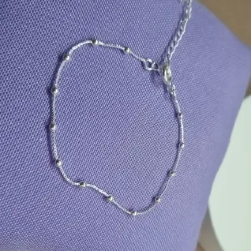 PULSEIRA PRATA INF BOLINHAS	