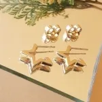 BRINCO OURO ARGOLA ESTRELA M