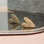 BRINCO OURO CORAÇÃO TORTO