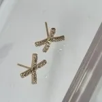 BRINCO OURO X ZIRC	