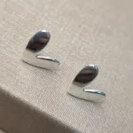 BRINCO PRATA CORAÇÃO TORTO
