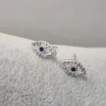 BRINCO PRATA OLHO ZIRC	