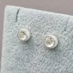 BRINCO PRATA PONTO DE LUG GG