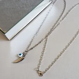 COLAR PRATA LONGO DENTE OLHO GREGO