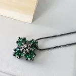COLAR RODIO NEGRO FLOR NAV ESMERALDA