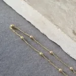 PULSEIRA OURO BOLINHA	