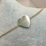 PULSEIRA OURO CORAÇÃO CHAPA	