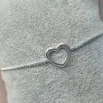PULSEIRA PRATA CORAÇÃO VAZADO 	