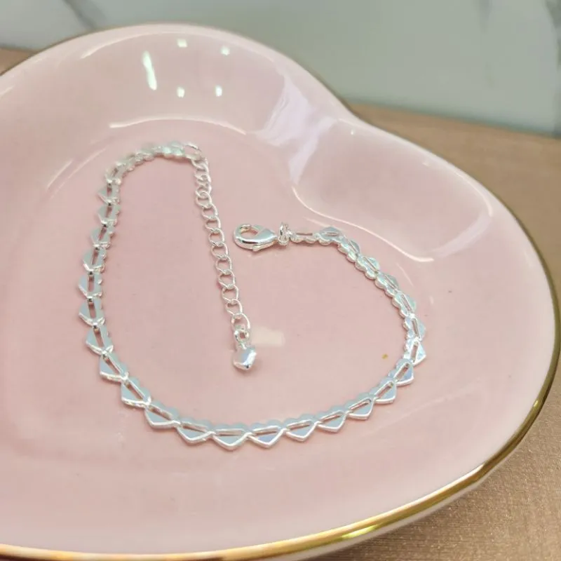 PULSEIRA PRATA CORAÇÕES TRAÇO