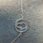 PULSEIRA PRATA HAMSÁ VAZADA ZIRC	
